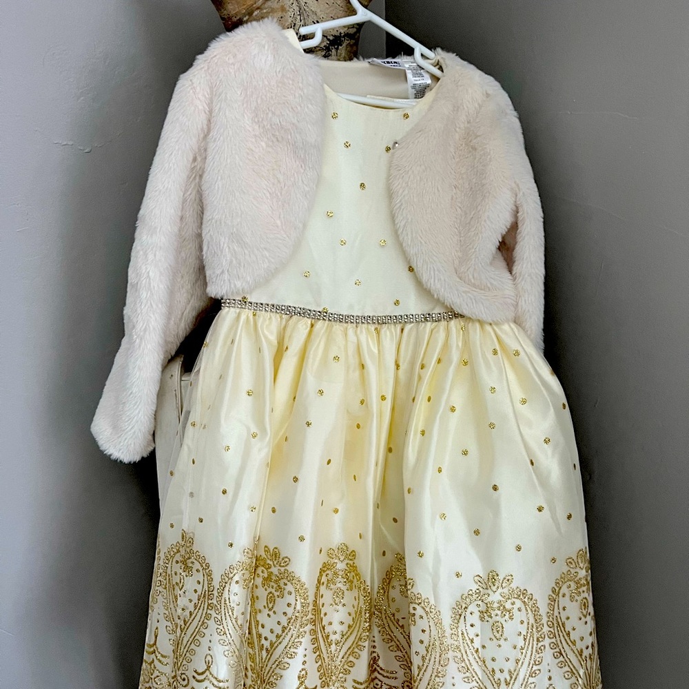 Girls ivory and gold dress.